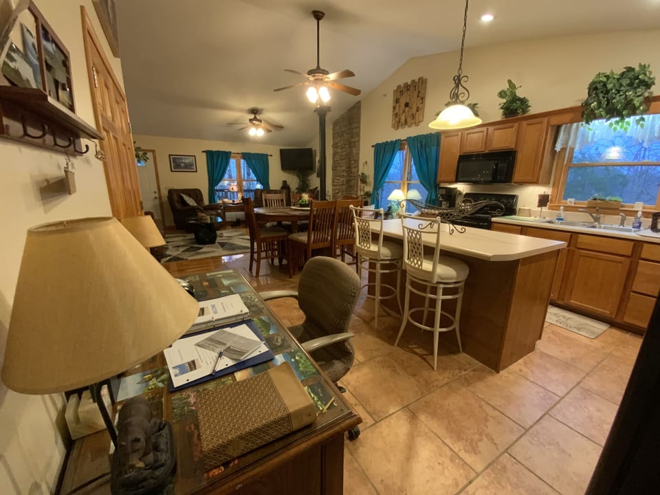 Welcome in. Nice open floor plan keeps everyone together but spaced