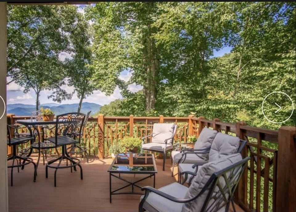 Back porch is perfect for breakfast lunch cocktails or just hanging out