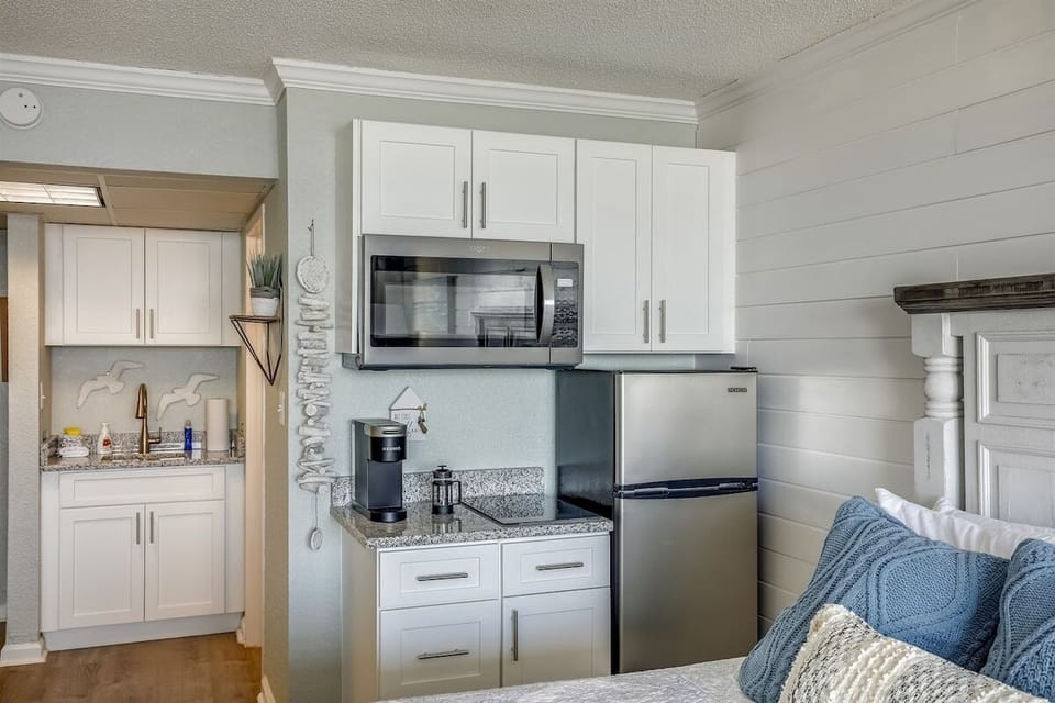 A convenient kitchenette for easy breakfasts and low-key meals in between plans.