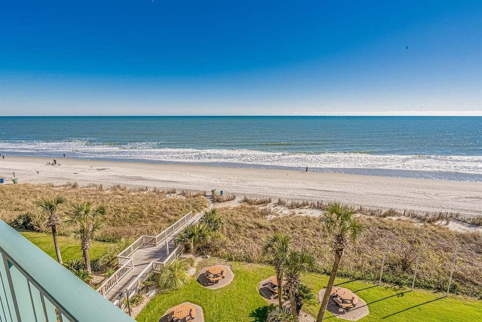 Direct access to the beach just below.