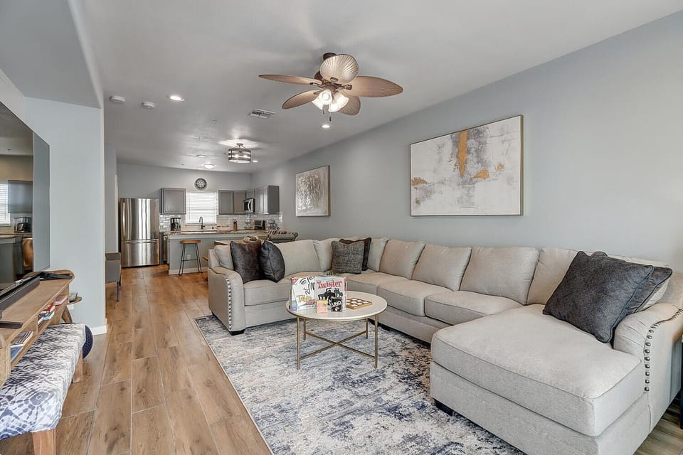 Indoor - The kitchen, dining, and living areas blend seamlessly for a bright and airy feel