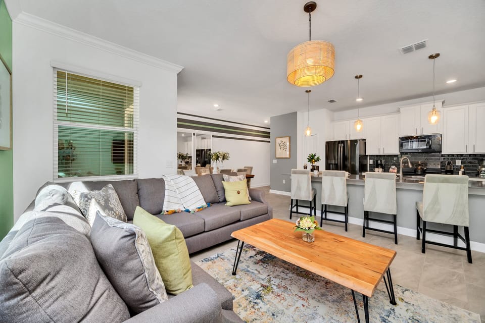 The Living room  has a comfortable seating, modern decor, and a cozy ambiance, it provides the perfect space for relaxation and leisure during your stay.