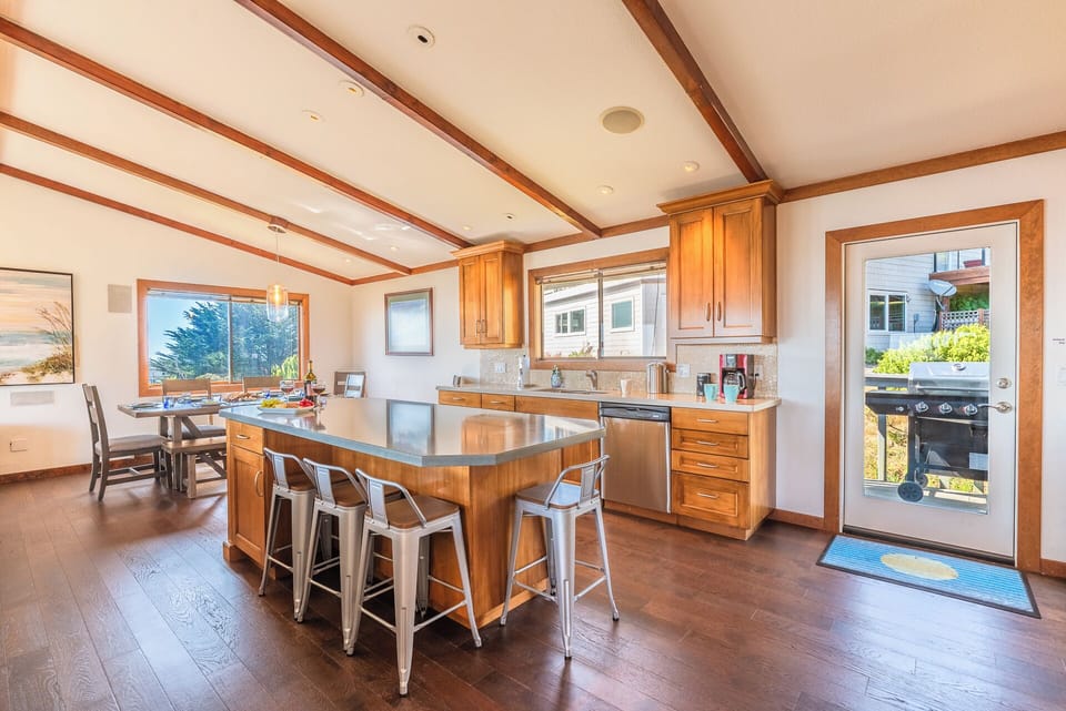 The kitchen island easily seats 4