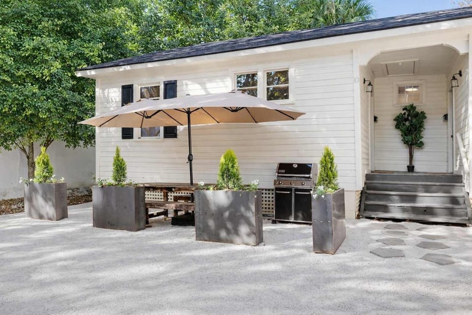 With a beautiful outdoor space and grill.