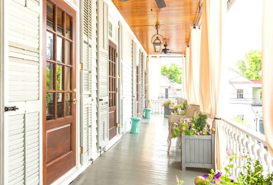 Victorian porches stretch the length of the home!