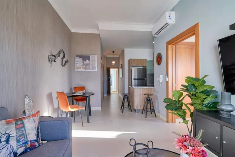 The Comfortable fully equipped Living Room, Private Terrace, 55 Inch Smart TV.