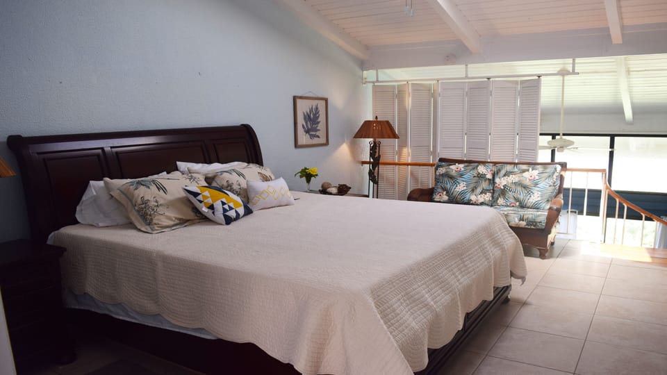 This is the upstairs bedroom that features a King sized bed.