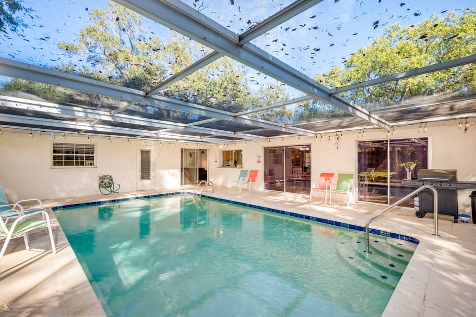 Whether sun bathing, swimming or barbecuing, it's all in the back yard. 
