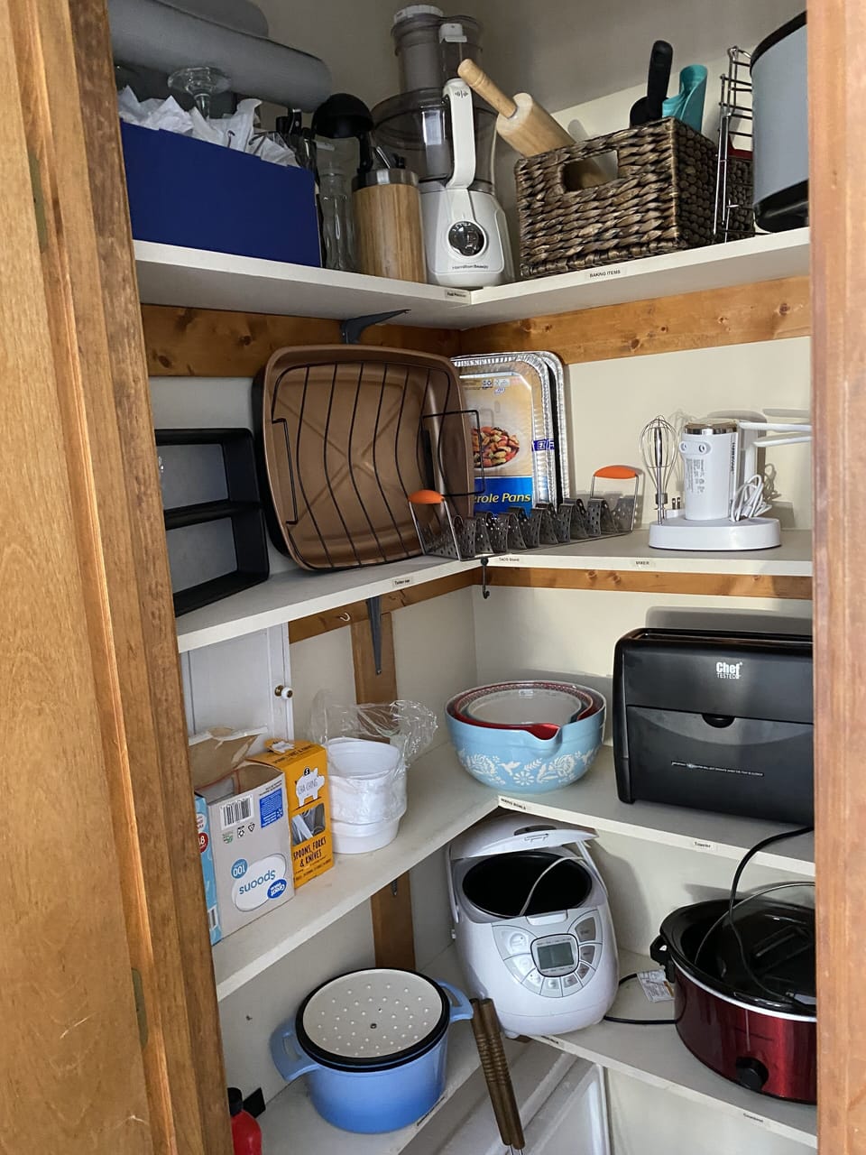 Pantry with blender, rice cooker, toaster, hand mixer, crockpot, food processor