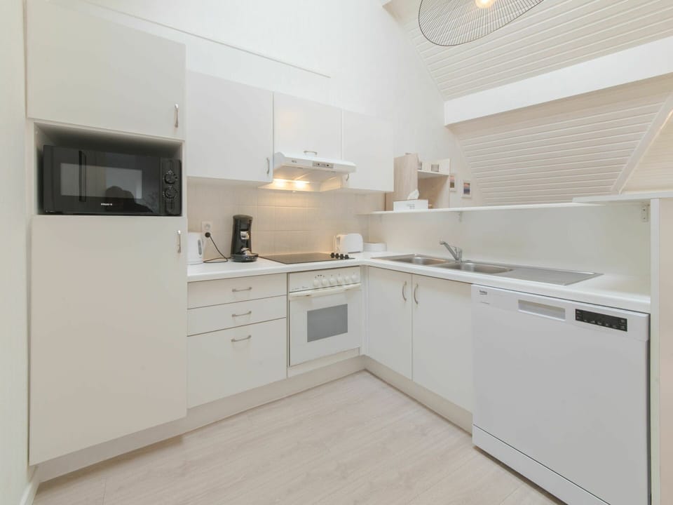 Cabinetry, Countertop, Kitchen Appliance, Kitchen Stove, Home Appliance, Kitchen, Wood, Building, Interior Design, Drawer