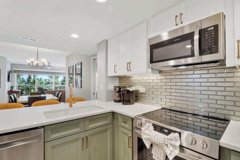 Kitchen is fully stocked with cookware and dishware
