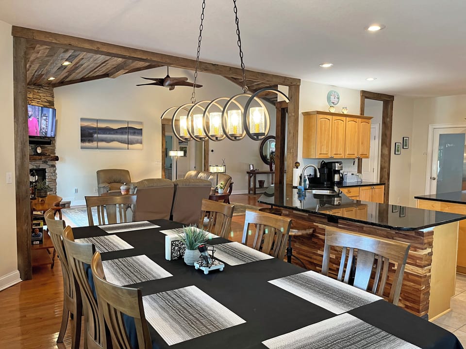The Main Level is laid out to flow nicely without interrupting work area making entertaining and cooking a pleasure!  Dining table will seat 10, with 5 more seats at the breakfast bar area.