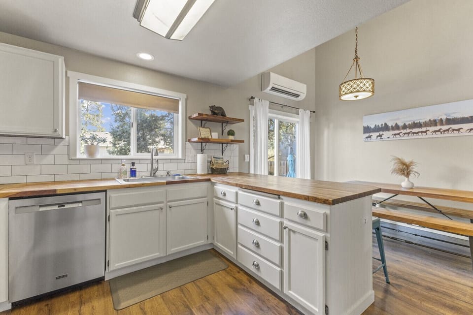 Butcher block island with bar seating for four