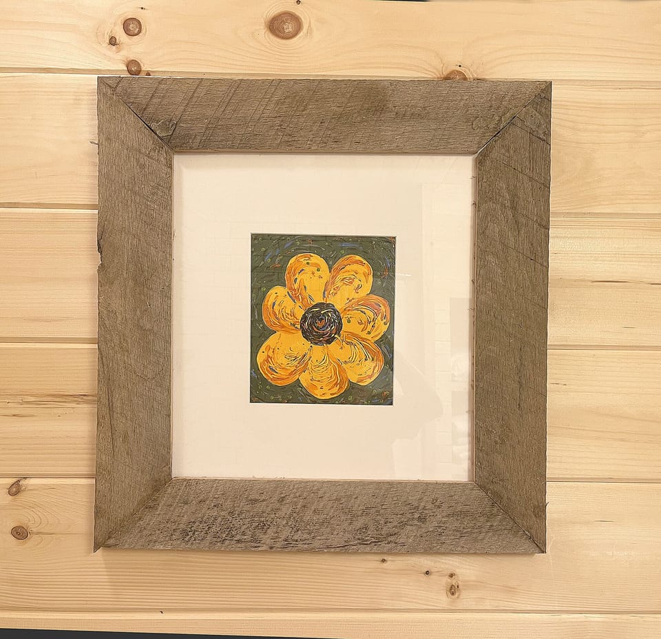 Our cabin is adorned with paintings my son and I made, including the frames.