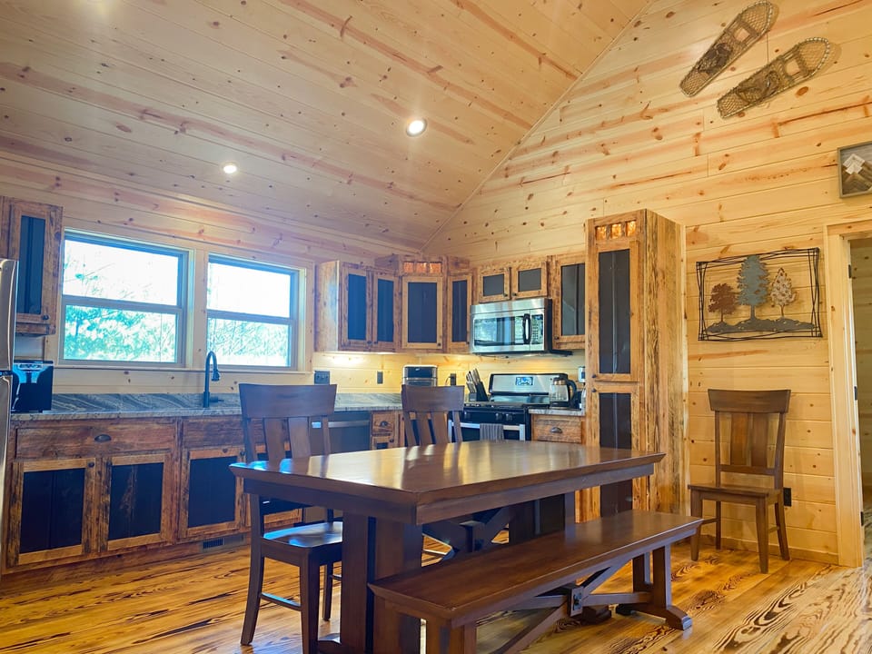 Kitchen with gas stove, microwave, air fryer/toaster oven, and all you need.