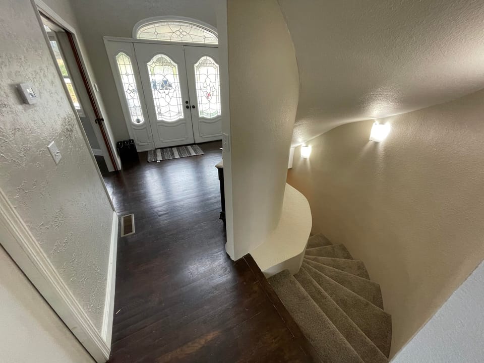 Entryway and stairs to lower level