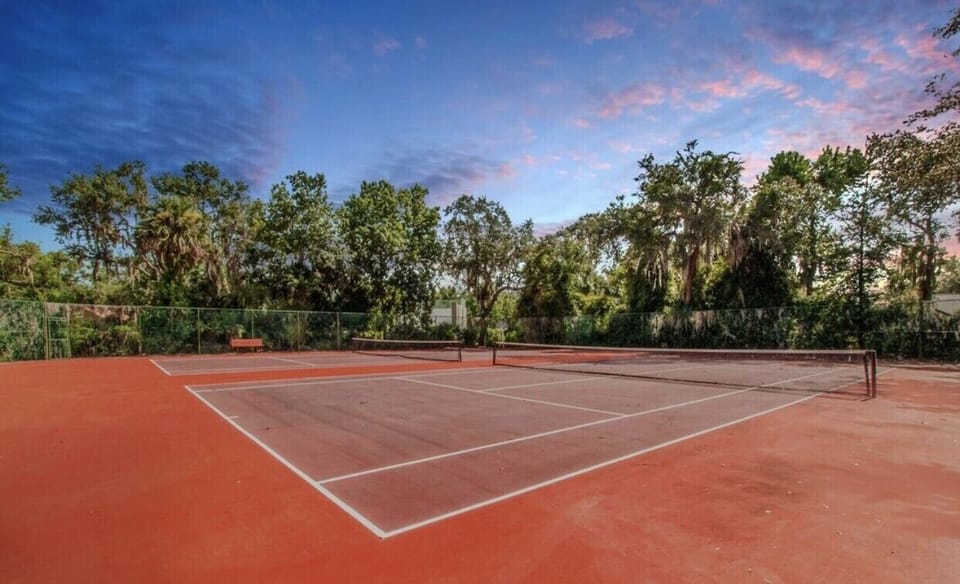 Communal tennis and pickle ball courts near the property. 