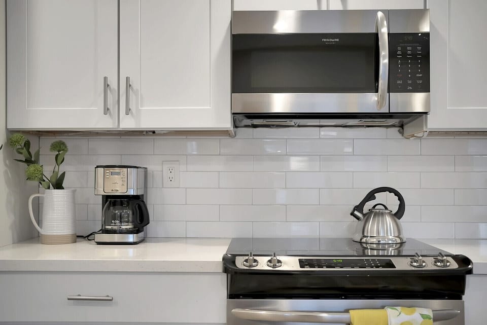 Experience our open kitchen, featuring stainless steel appliances