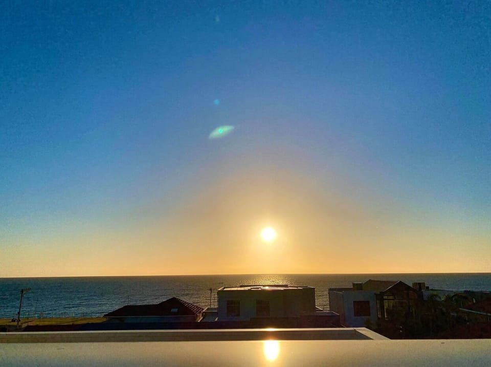 OCEAN FROM THE ROOFTOP