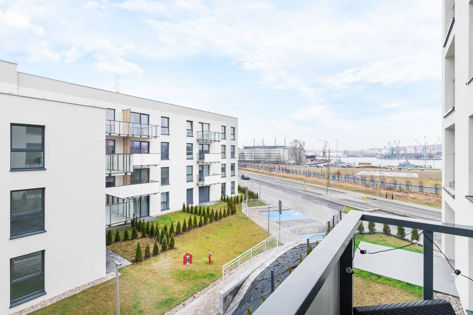 The balcony provides a perfect spot for enjoying the fresh air. 