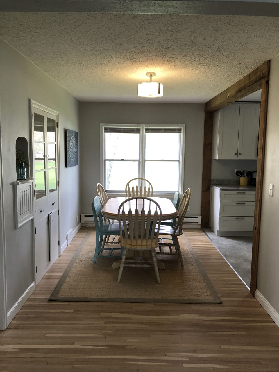 Eating area and game cupboard 