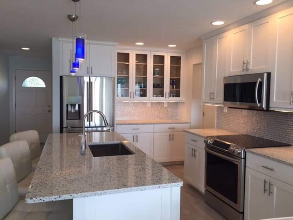 Beautiful stocked kitchen with high end appliances and enough room for everyone