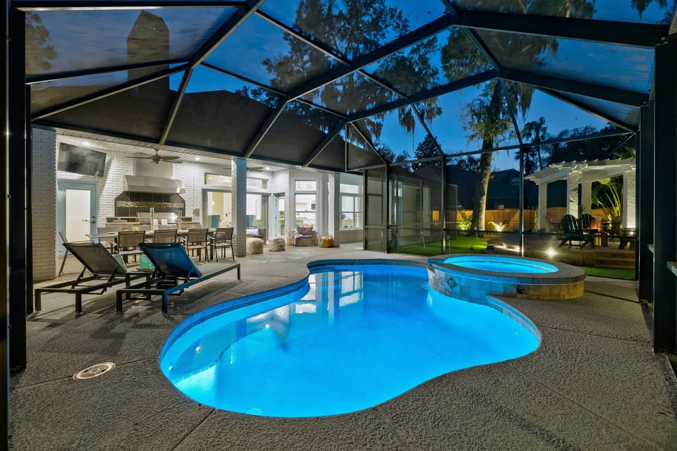 Screened-in heated pool & spa - enjoy year round relaxation