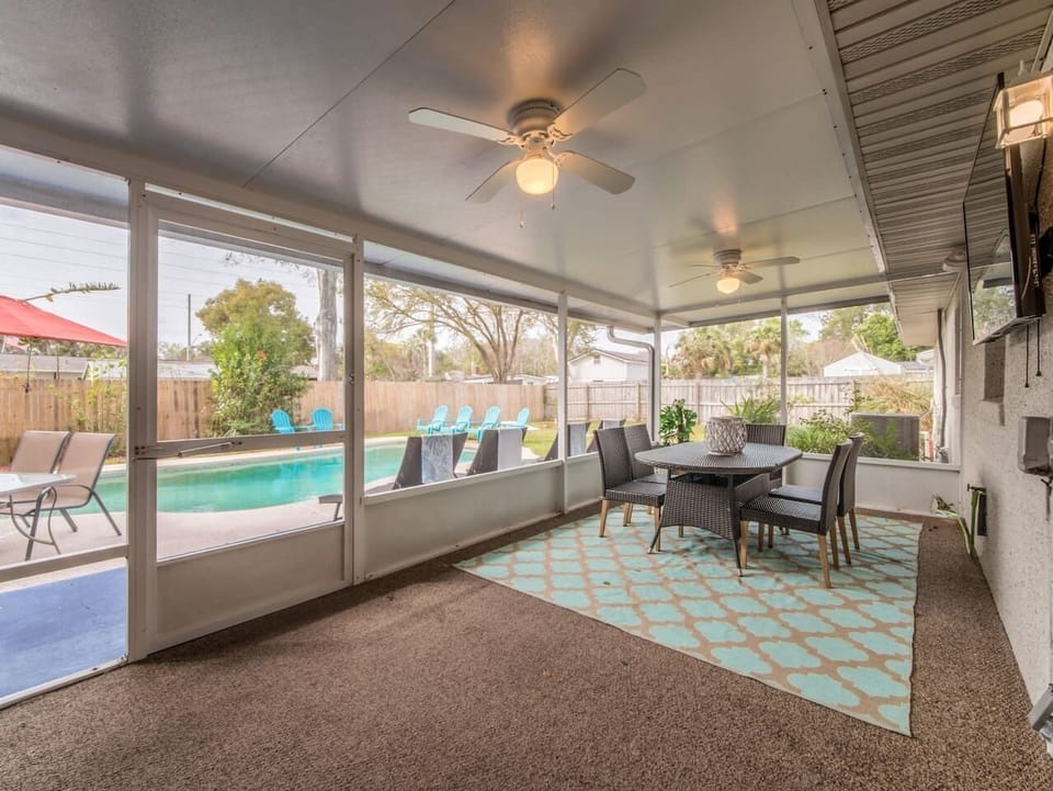 Screened-in patio with TV - Enjoy bug free evenings 