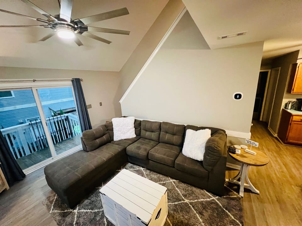 Cozy living area with 65" TV. 