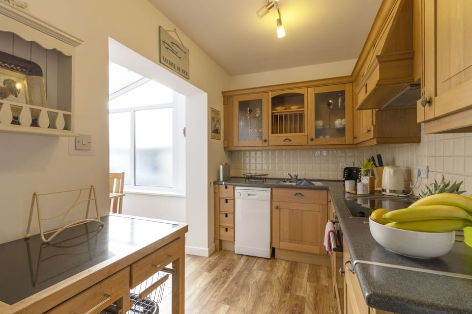 Kitchen leading through to dining area