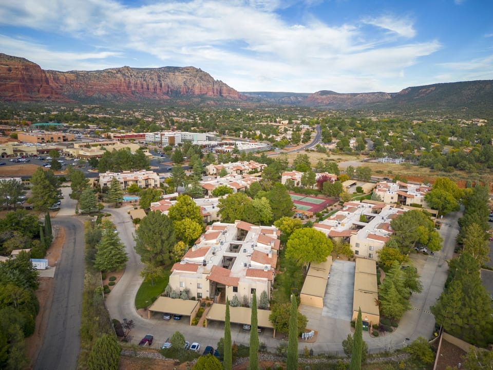 Big Trees all over the Complex surrounded by Red Rock Views