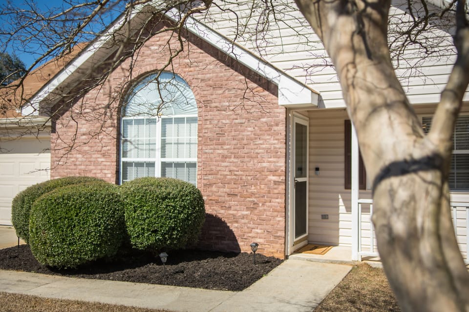 Front entry with single-car garage.