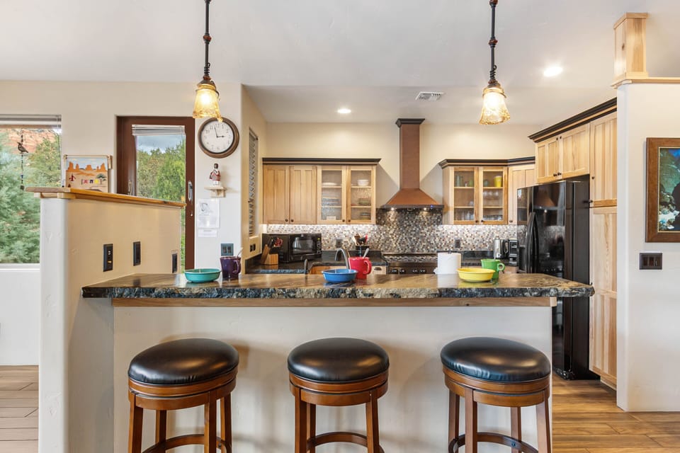 Kitchen island with bar seating for three.