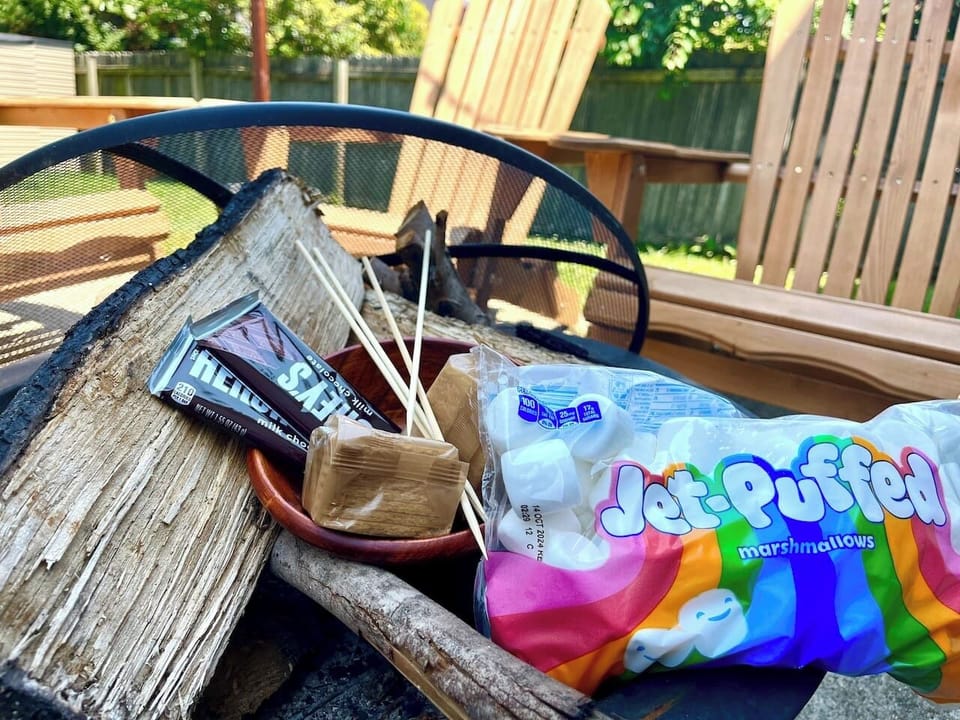Have fun making s’mores with friends & family by the fire under the stairs! 