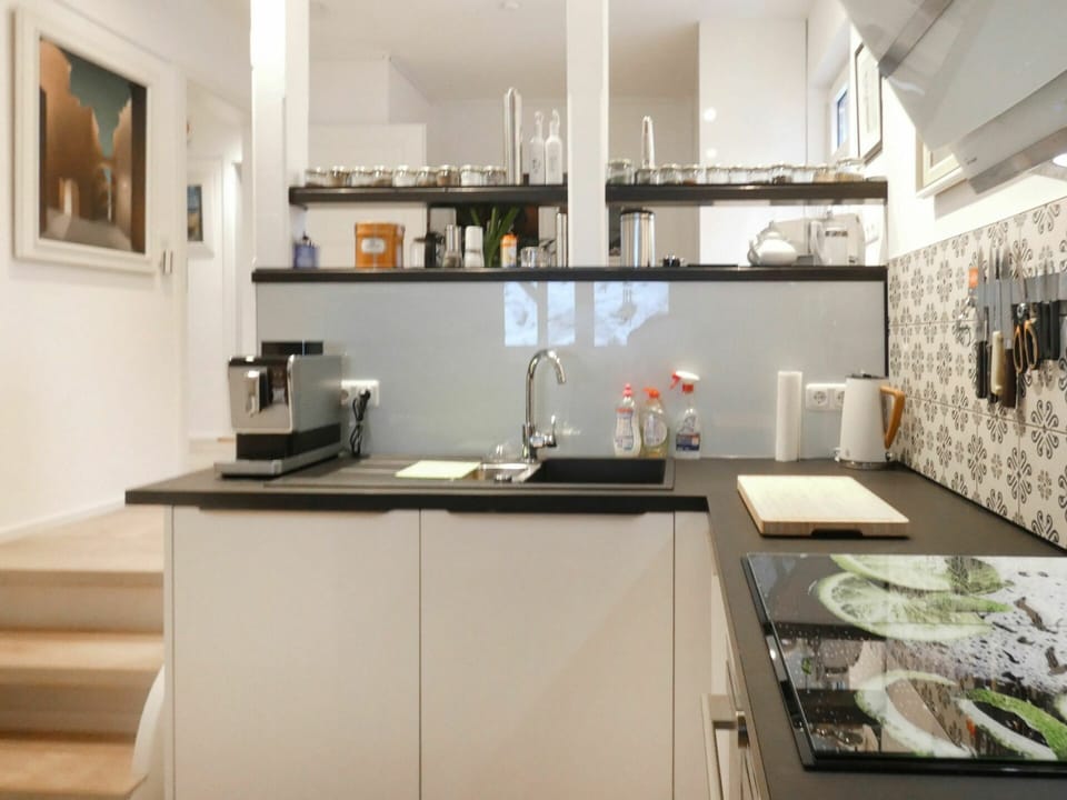 Cabinetry, Countertop, Sink, Kitchen Sink, Tap, Kitchen Stove, Kitchen, Wood, Home Appliance, Lighting