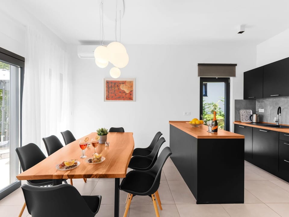 Table, Furniture, Building, Window, Cabinetry, Chair, Wood, Lighting, Plant, Orange