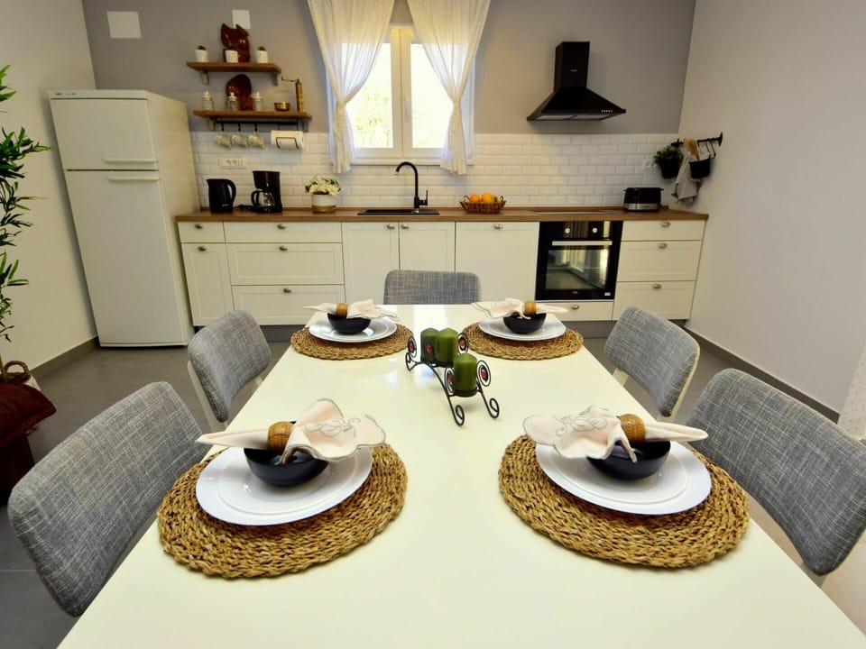 Table, Furniture, Property, Tableware, Dishware, Chair, Lighting, Wood, Interior Design