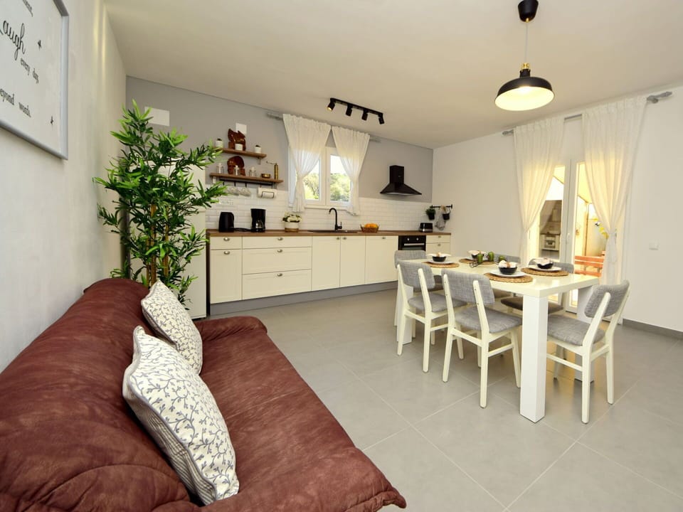 Furniture, Interior Design, Flooring, Floor, Wood, Ceiling, Room, Table, Chair, Lighting