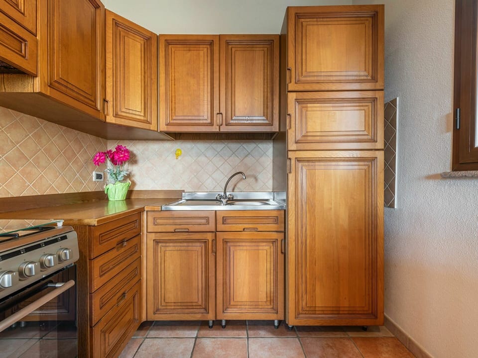 Cabinetry, Countertop, Furniture, Kitchen, Kitchen Sink, Wood, Drawer, Building, Flooring, Lighting