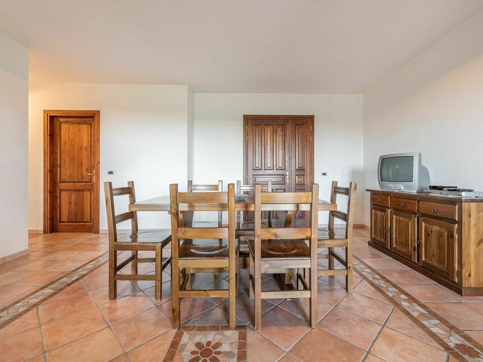 Table, Furniture, Cabinetry, Wood, Chair, Interior Design, Architecture, Door, Building, Flooring
