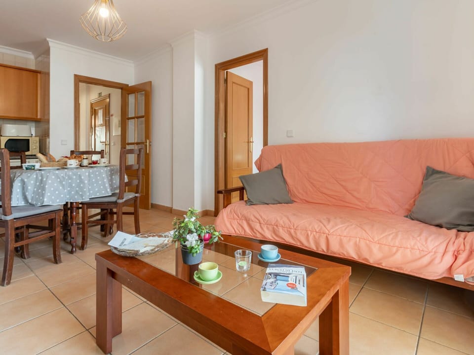 Table, Furniture, Property, Couch, Comfort, Wood, Picture Frame, Orange, Textile, Interior Design