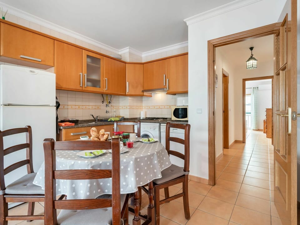 Cabinetry, Furniture, Countertop, Table, Kitchen, Chair, Wood, Interior Design, Flooring, Floor