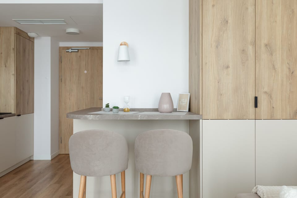The living room's sleek design is both functional and aesthetically pleasing.