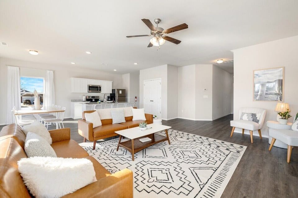 Not only do we love the open floor plan, but we love how bright and inviting this space is.