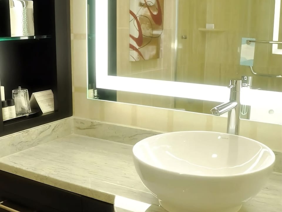 Enjoy a modern, glowing vanity for effortless get-ready moments.
