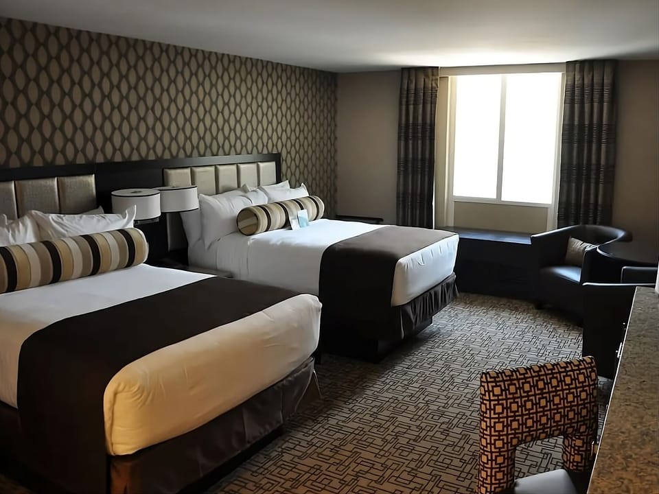 Wake up to bright comfort in a roomy two-bed retreat.
