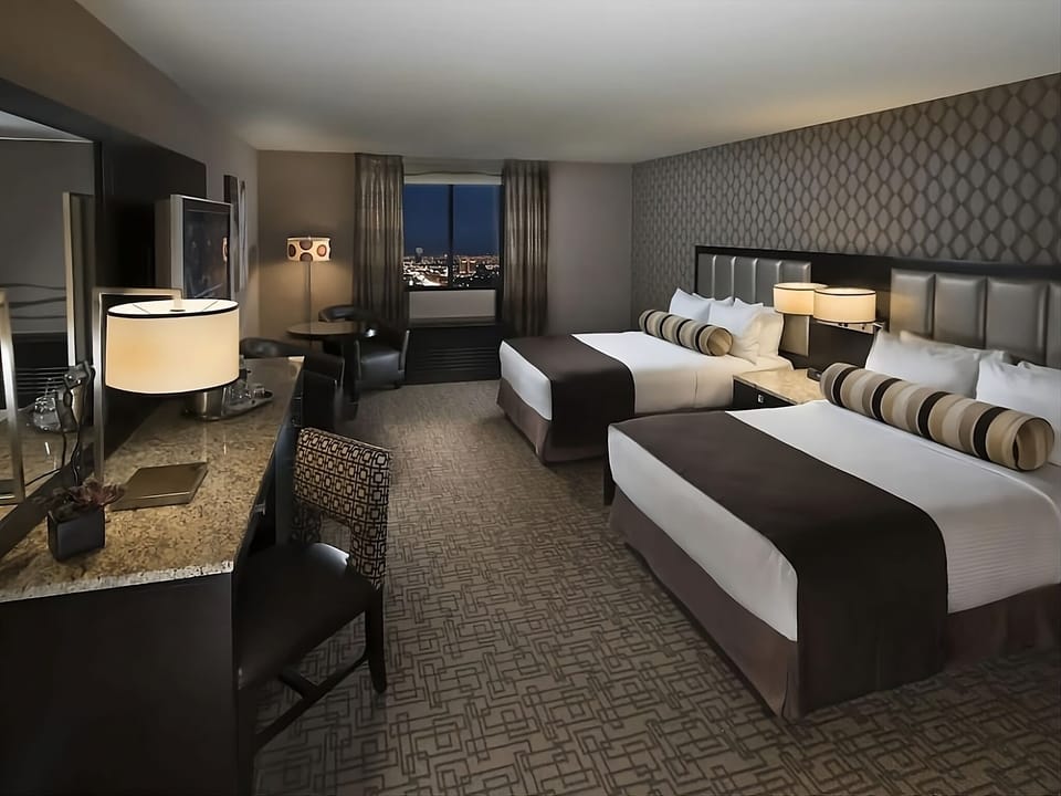 Relax together in a spacious room with sparkling night views.