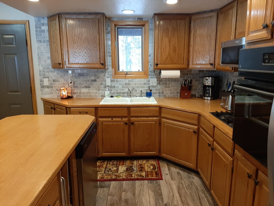 Kitchen showing cub boards for your food.