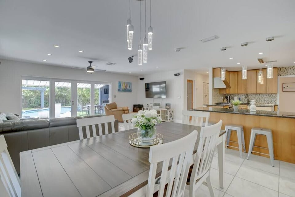 `Dinner parties with a touch of grandeur: This dining room is where culinary delights meet design dreams.`