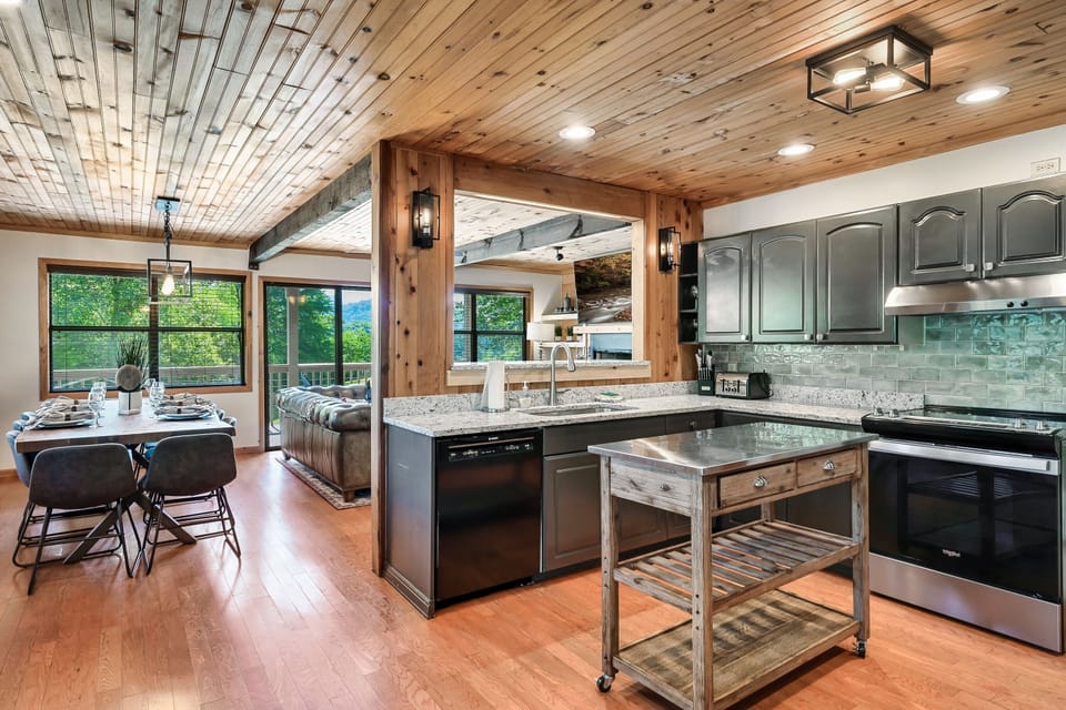 kitchen from the side door and staircase to upper level